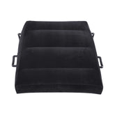 The SS Pivot Inflatable Positioner Plus by Sportsheets is a black seat cushion featuring four horizontal ridges and two handles on each side, designed to enhance intimate moments during your bedroom adventures. Its simple, square design appears to be made of soft fabric, providing both comfort and versatility as an inflatable positioner.